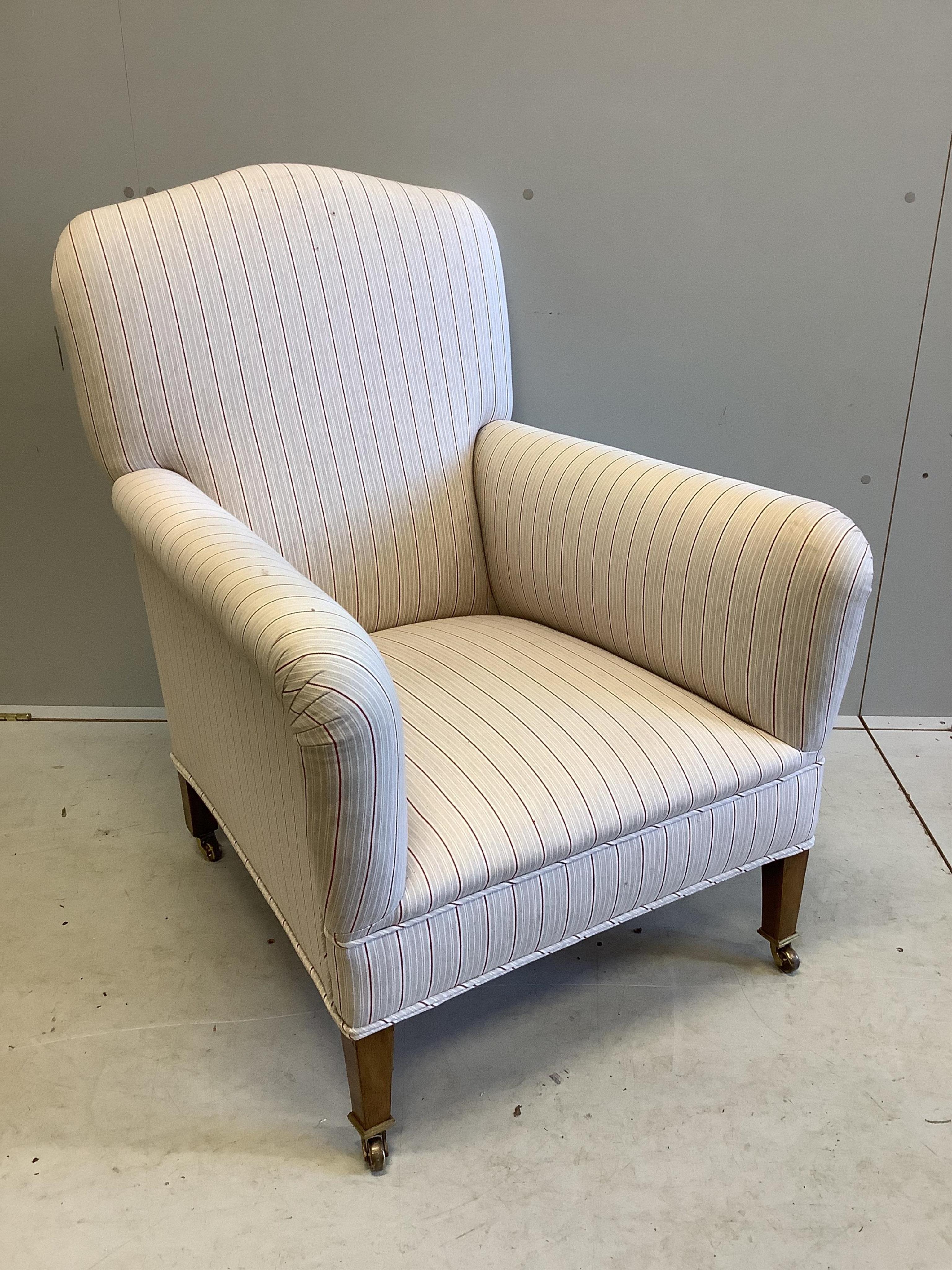 An Edwardian upholstered armchair, width 69cm, depth 75cm, height 90cm. Condition - good